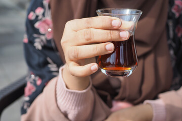 women drinking Traditional turkish tea 