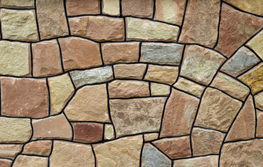 Split red natural stone is used in construction