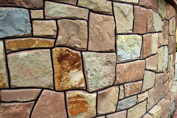 Split red natural stone is used in construction