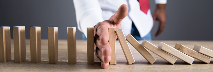 man hand wooden cube