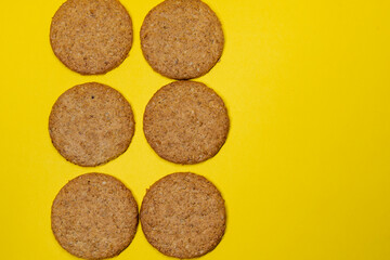 oatmeal cookies on a yellow background