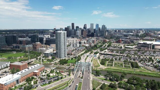Fade back shot of Downtown Denver from the West looking at N Speer Blvd