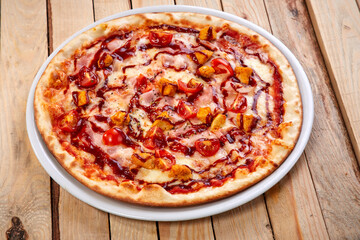 pizza on the wooden background