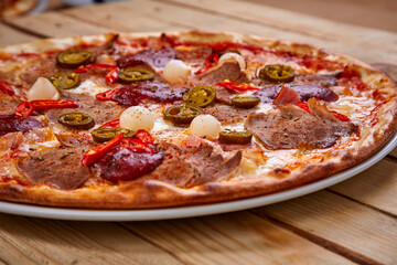 pizza on the wooden background