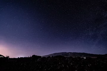 Fotobehang Stargazing at  Mauna Loa Observatory Road, Big Island Hawaii. Starry night sky,  Milky Way galaxy astrophotography. Mauna kea. Ursa Minor and Ursa Major © youli