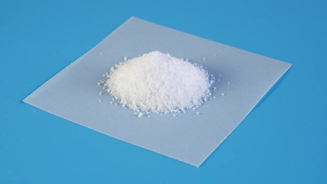 Aspartame powder, sugar substitute. Food additive  E951, artificial sweetener used as sugar substitute in foods and beverages.