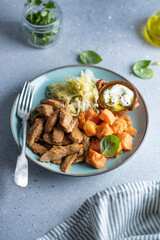 Cooked meat with vegetables and spices