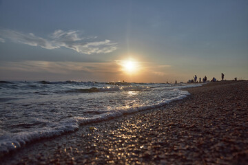Orange-gold sunset, sky, sunlight, summer mood landscape with sea sunset on beach.