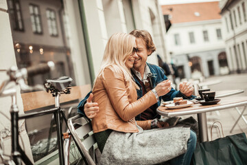 Mature couple sitting in a cafe having a coffee