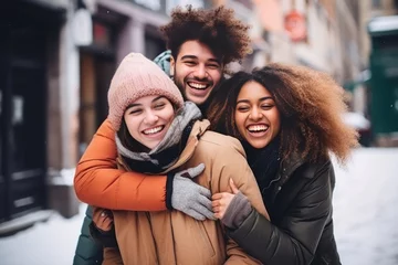 Fotobehang Multiracial group of friends having fun together outdoors on city street- in winter - Young cheerful people walking hugging outside- Next gen z lifestyle concept-Smiling students © Adriana