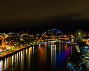 Fototapeta na wymiar Gateshead millennium Bridge and Quayside Newcastle