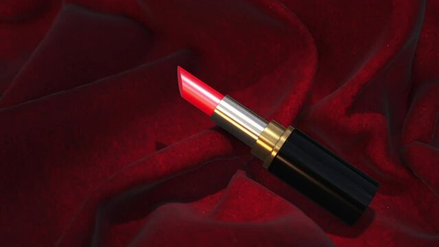 Red lipstick on a red silk background. Beauty and fashion still life