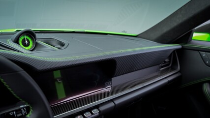 Black dashboard with green accents