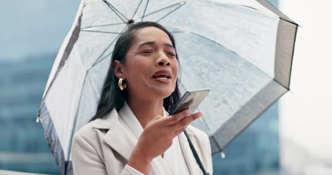 Rain, phone call and business woman in city for networking, communication and contact. Professional, negotiation and recording with person and umbrella in new york for manager, app and conversation