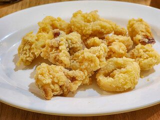 crispy squid in white plate