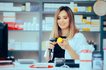 Pharmacist Scanning a Medicinal drug on Sale for Customers. Happy drugstore vendor reading a bar code on a medicament package
