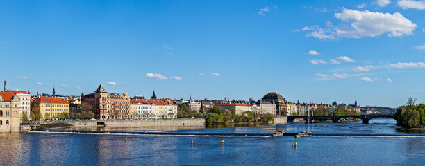 Fototapeta na wymiar Panorama of Prague Stare Mesto embankment and Vltava river view from Charles bridge. Prague, Czech Republic