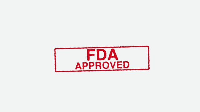 Close Up Real Hand Stamping FDA Approved Stamp on White Background