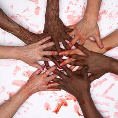 Blood on your hands, women of diversity  protesting for choice. 