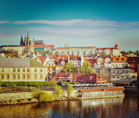Fototapeta na wymiar Vintage retro hipster style travel image of Mala Strana and Prague castle over Vltava river. Prague, Czech Republic