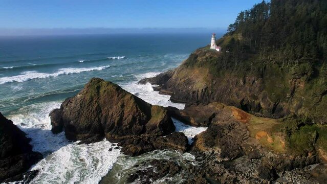 Aerial View of the Ocean with Heceta Head Lighthouse on a Cliffside