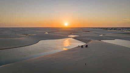 sunset on the beach, dunes and ponds, beach and sky