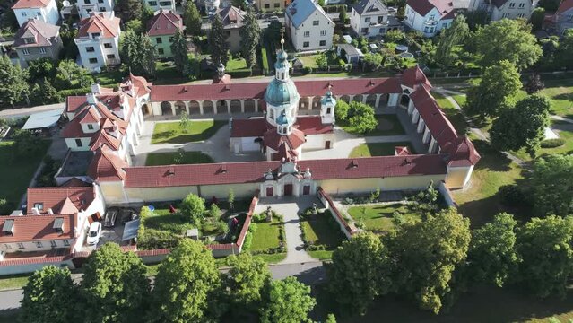 Aerial View, Church of Our Lady Victorious in Bílá Hora Neighborhood of Prague, Czech Republic, Drone Shot