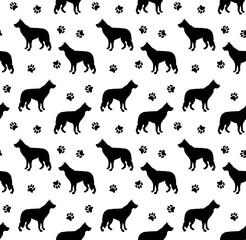 Vector seamless pattern of shepherd dog silhouette and paw footprints isolated on white background