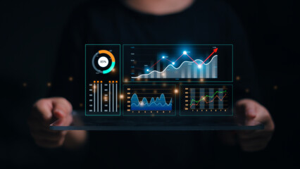 Data analyst working on business analytics dashboard with charts, metrics and KPI to analyze...