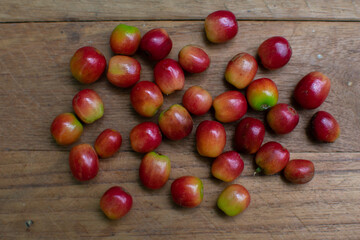 Coffee fruit on table-ready to give sunlight 