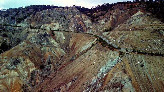 A superbly photographed view displays the majesty of the Amiandos Asbestos Mine mountain ranges. The exceptional view of an impressive roadway is clearly visible.