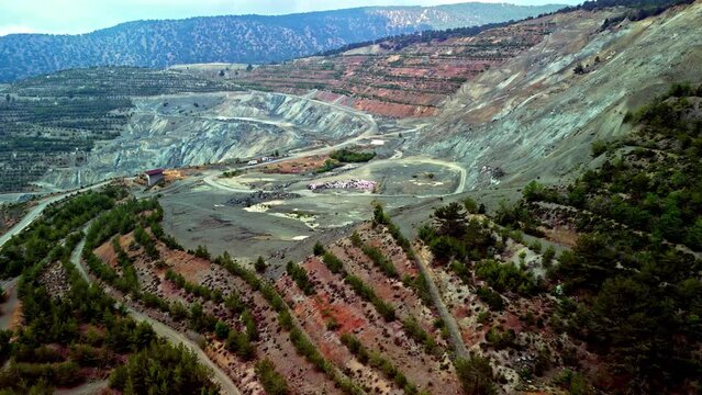 The outstanding imagery showcases the grandeur of the Amiandos Asbestos Mine mountain ranges. A remarkable view of a substantial roadway is prominently discernible.