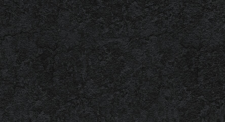rough black plaster on the wall for background