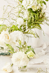 Fototapeta na wymiar Eustoma, rose, gypsophila flowers. Cozy home, biophilic interior, harmonious place, wedding design table concept
