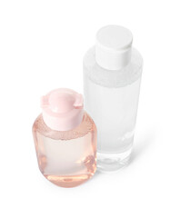 Bottles of micellar water on white background