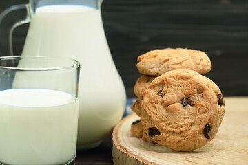Homemade chocolate chip cookies, Cookies and a jug of milk