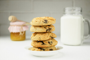 Homemade chocolate chip cookies, Cookies and a jug of milk