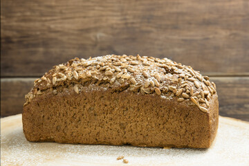 Fresh dark bread. Rye bread on the board