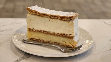 puff pastry with a whipped pastry cream napoleon cake in bakery