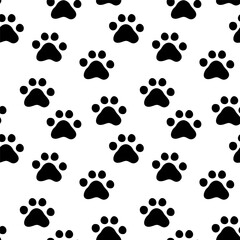 Seamless pattern with paw prints of cat or dog. Cute monochrome animalistic background.