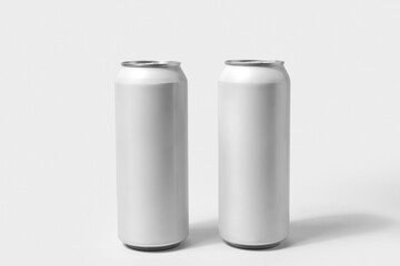 Cans of fresh soda on white background