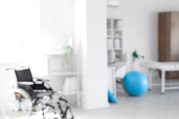 Blurred view of rehabilitation center with shelving units