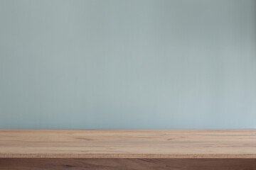 background with modern wooden table and blue  wall