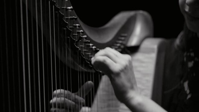Woman Playing Harp in Black and White and Slow Motion