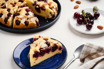 Homemade cherry cake with almond nuts