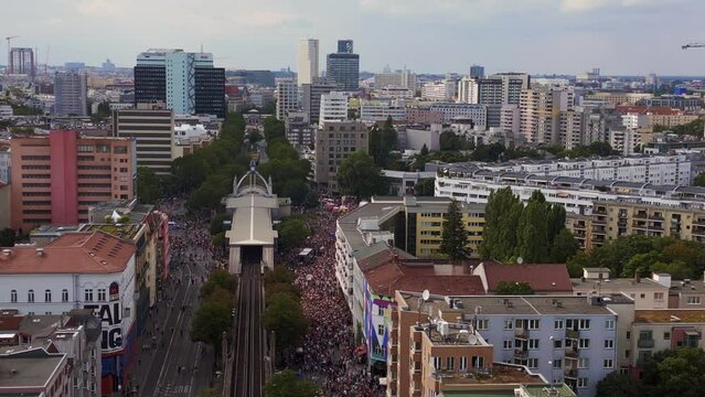 Perfect aerial top view flight
CSD Pride Love Parade 2023 in city Berlin Germany Summer day. panorama overview drone
4K Cinematic footage.