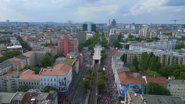 Amazing aerial top view flight 
CSD Pride Love Parade 2023 in city Berlin Germany Summer day. panorama overview drone
4K Cinematic footage.