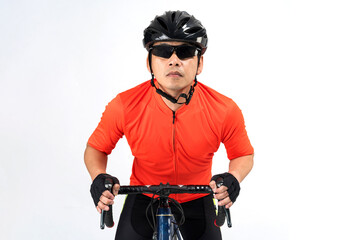 Fototapeta na wymiar Cyclist with helmet and sunglasses riding a bicycle