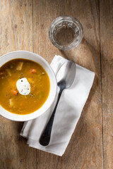 Vegetable soup on a wooden table