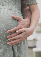 Close Up of Hands on Pregnant Belly